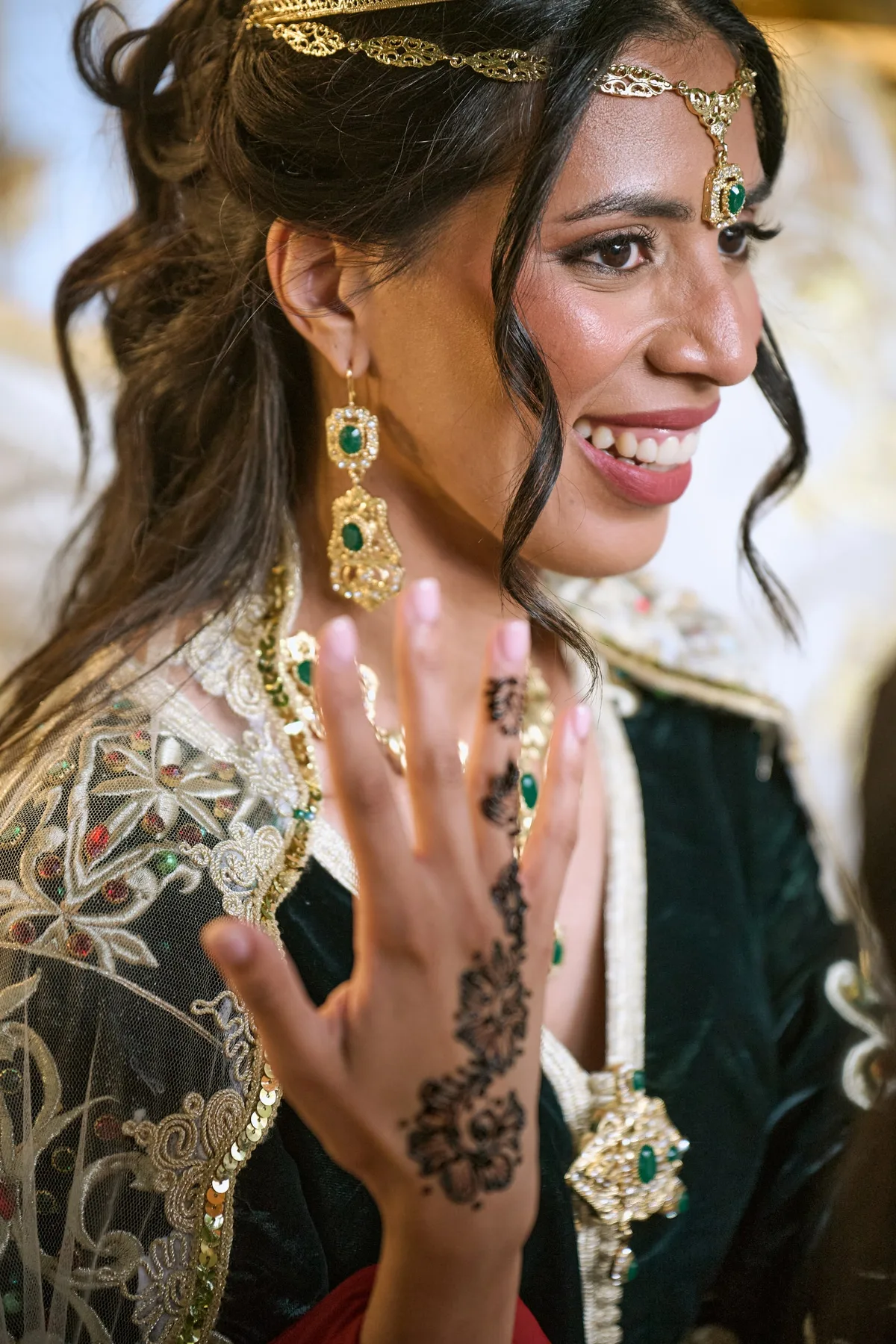 Hanan's hand decorated with henna
