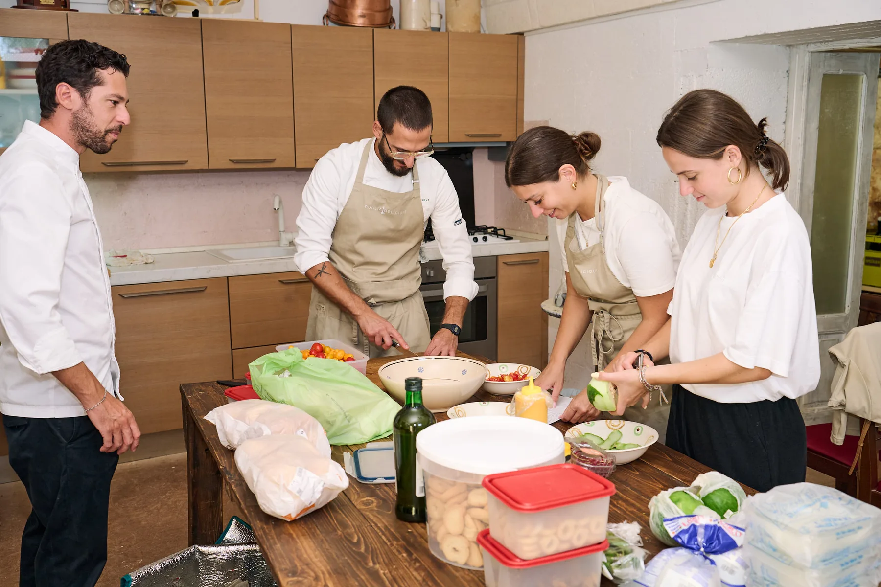 The chefs preparing food in the estate kitchen