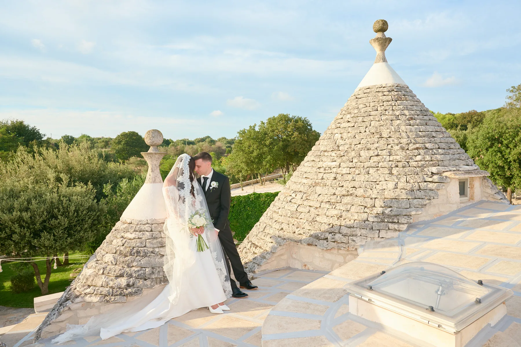 Jenny and Brad among the trullo cones on the rooftop