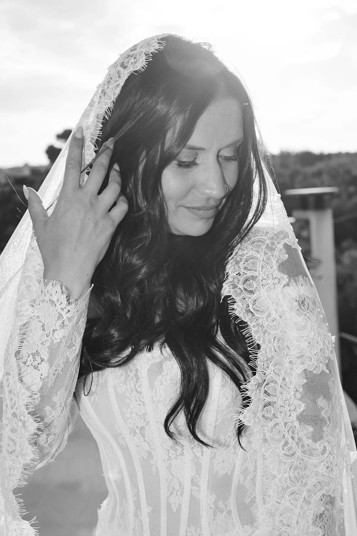 Portrait of Jenny in her lace veil, in black and white