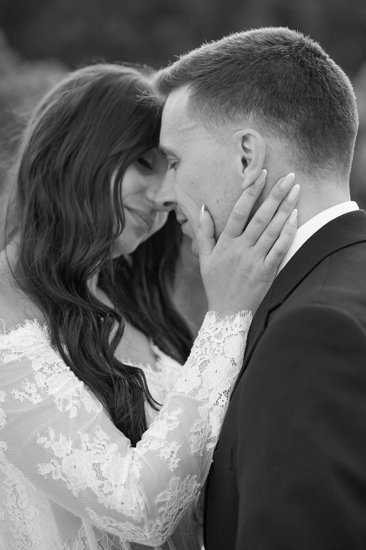 Jenny and Brad embracing, black and white portrait