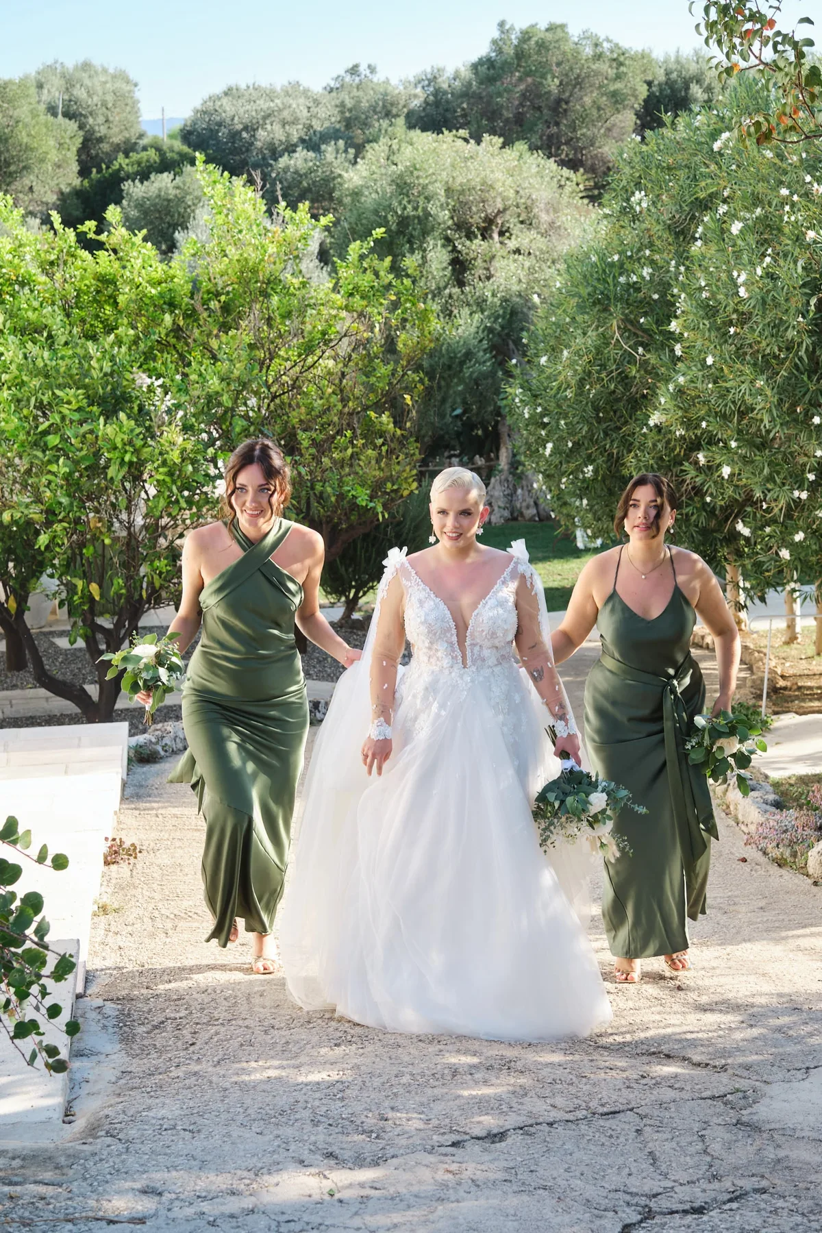 Natasha arriving at the ceremony with her bridesmaids