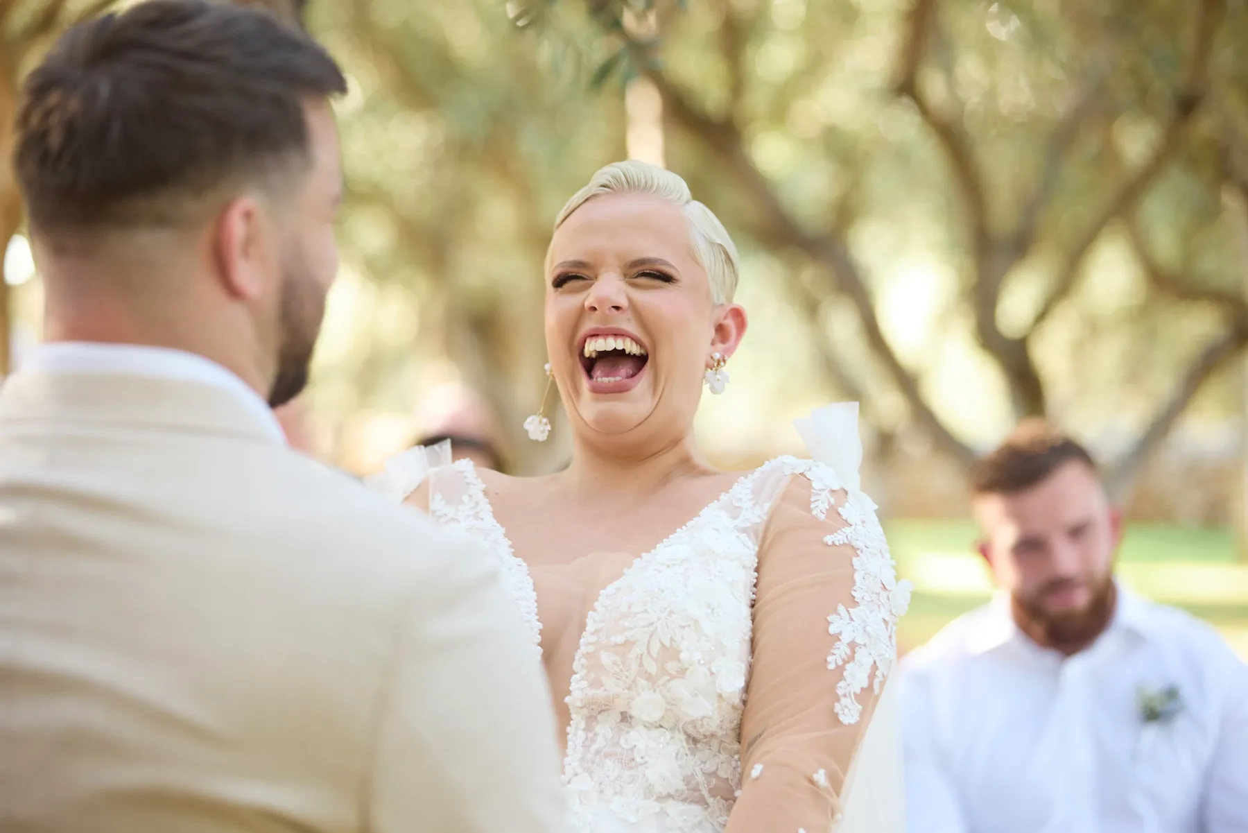 Natasha laughing during the vows