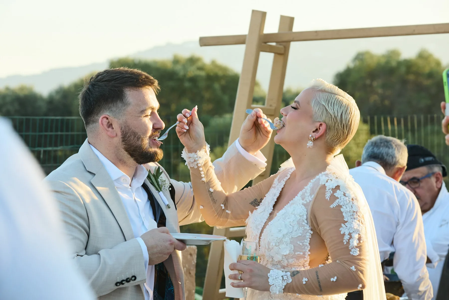 The couple feeding each other during the aperitivo