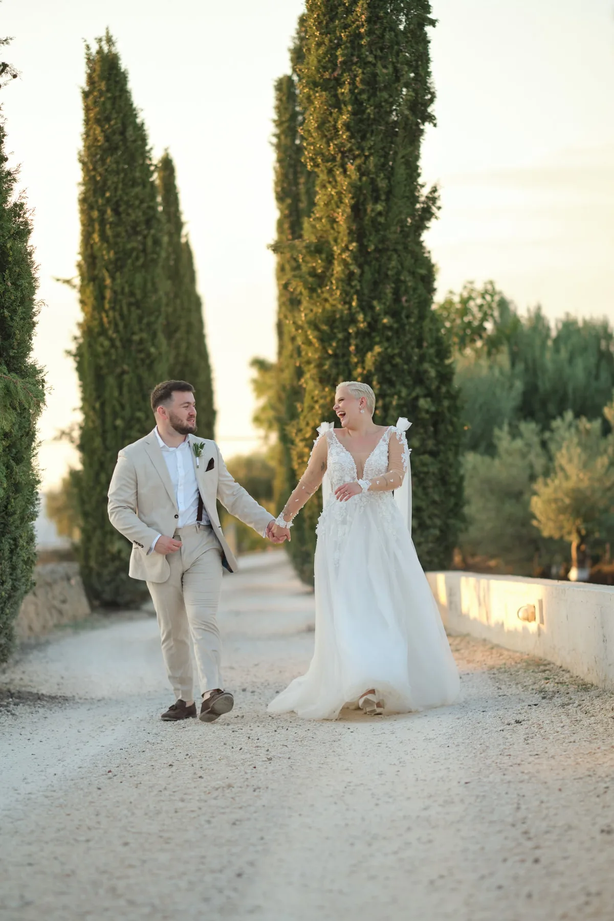Natasha and Michael on the cypress-lined avenue