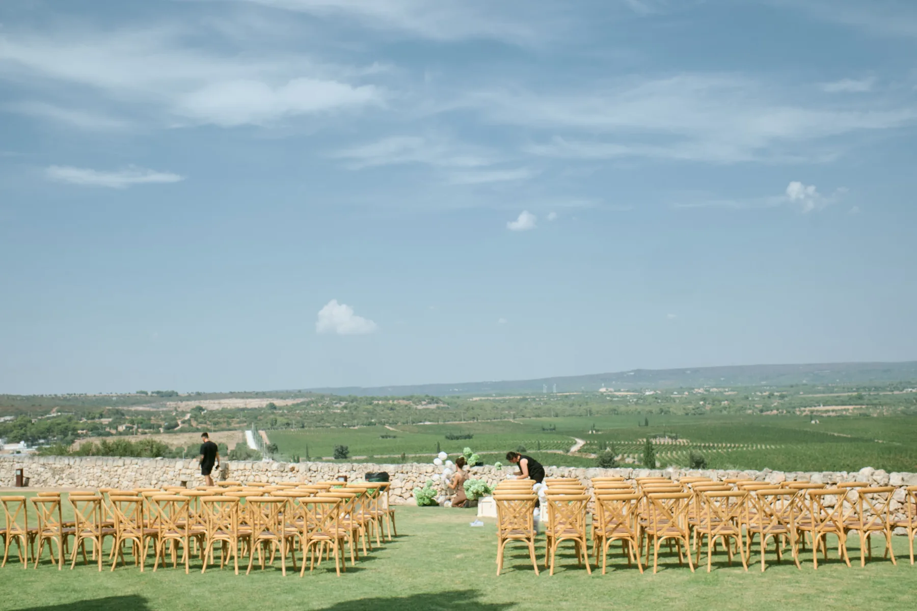 The ceremony chairs on the lawn overlooking the countryside