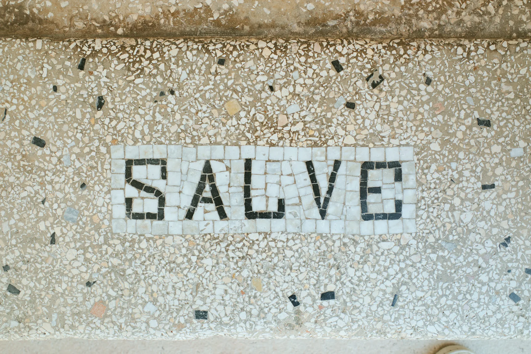 The word “Salve” in mosaic