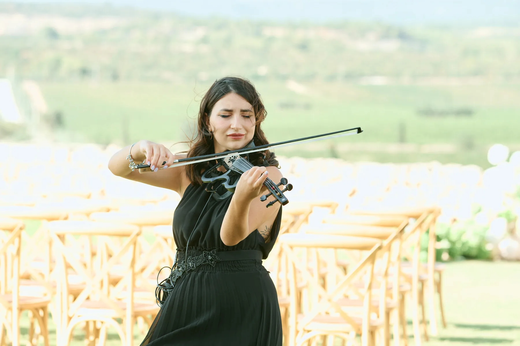 A violinist playing before the ceremony