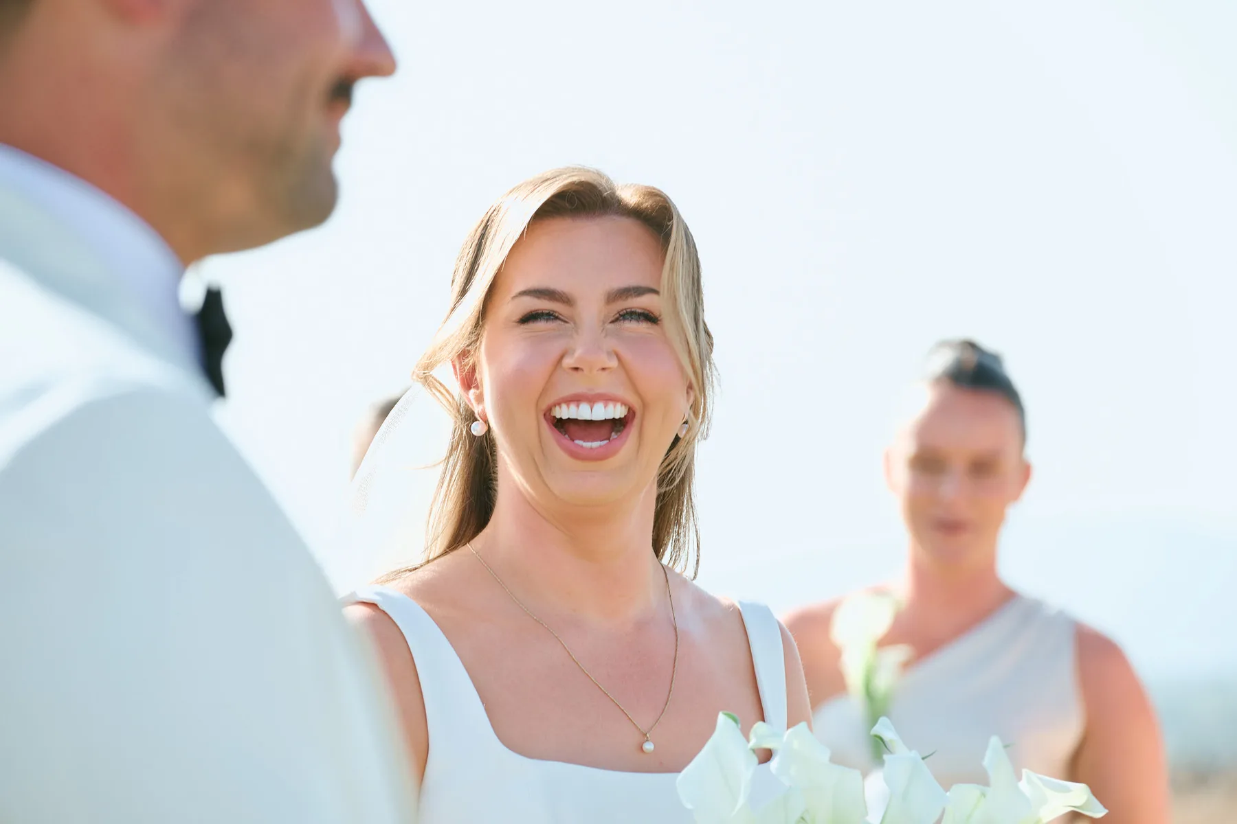 The bride laughing during the ceremony