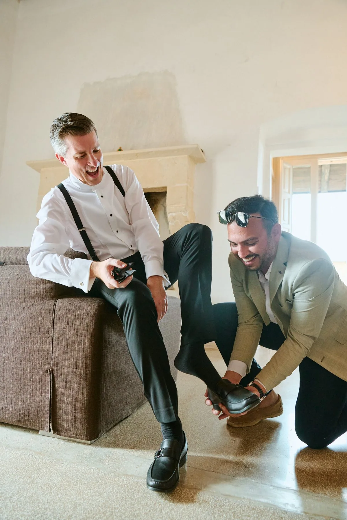 Gregory getting ready with his groomsmen before the ceremony